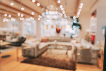 Wall Mural - Home accessories and household products in store of shopping centre. View of home accessories for living room in shop fashion retail store. Sofa with pillows. Abstract blur blurred boke bokeh