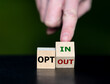 Cubes form the expressions 'opt in' and 'opt out'.