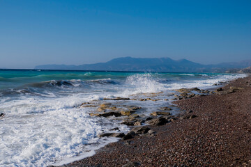 Wall Mural - East shore of Rhodes Island with big waves and rocky beach