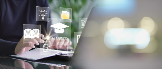 Fototapete - Concept of Online education. man use Online education training and e-learning webinar on internet for personal development and professional qualifications. Digital courses to develop new skills..