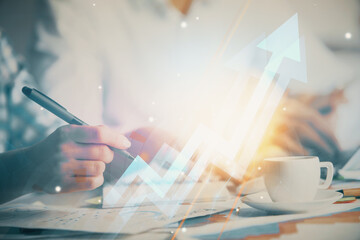 Poster - Double exposure of arrow drawing over people taking notes background. Concept of growth