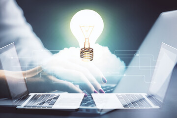 Poster - Double exposure of woman hands typing on computer and light bulb drawing. Idea concept.