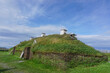 Newfoundland, Canada: Recreated Norse building at L’Anse aux Meadows (trans. Meadows Cove), the archeological site of a Norse settlement dating from 990 to 1050 CE.