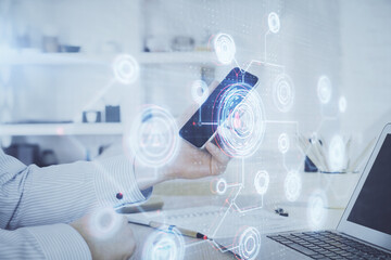 Poster - Double exposure of man's hand holding and using a digital device and data theme hologram drawing. Technology concept.