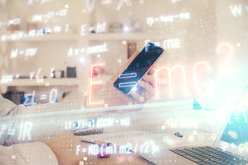 Poster - Double exposure of man's hands holding and using a phone and formulas drawing. Education concept.