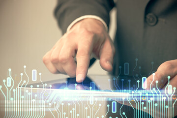 Poster - Multi exposure of man's hand holding and using a digital device and data theme drawing. Innovation concept.