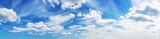 Fototapeta Na sufit - Panoramic view of the sky with beautiful cloudscape in sunny day.