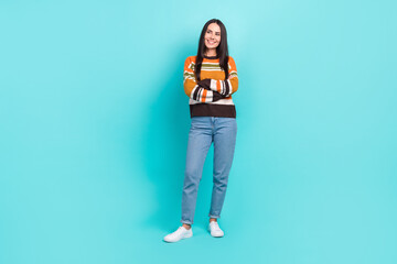 Sticker - Full length photo of sweet dreamy lady dressed striped pullover looking empty space arms folded isolated teal color background