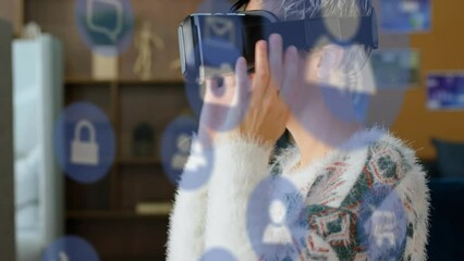 Poster - Animation of multiple digital icons floating over caucasian woman wearing vr headset at office