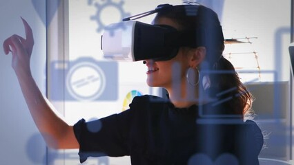 Poster - Animation of multiple digital icons floating over caucasian woman wearing vr headset at office