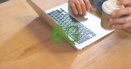Poster - Animation of neon 6g text banner against mid section of man using laptop at a cafe