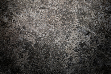 Gray textured cement wall background with fine concrete chips. Construction backgrounds