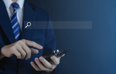 Wall Mural - businessman showing internet search on smartphone