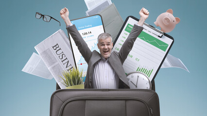 Wall Mural - Successful businessman in a briefcase