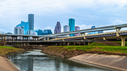 Wall Mural - Houston Downtown City Skyline and water reflections along the White Oak Bayou Greenway under Interstate 45 Freeway in Texas, USA