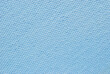 Blue color cotton boucle fabric texture as background
