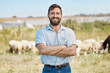© K Davis/peopleimages.com - Man, portrait or arms crossed on livestock agriculture, sustainability environment or nature land in ideas, vision or hope. Smile, happy or confident farmer and animals growth or sheep farming