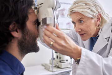 Poster - Doctor with a man in vision test or eye exam for eyesight by a focused senior optometrist or ophthalmologist. Optician helping check retina health of a client or happy customer with medical insurance