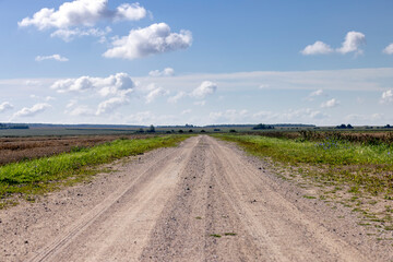 Wall Mural - Unpaved highway in rural areas