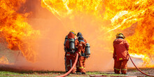 Firefighter Training New Fireman Team Stop Fire From Oil Plant Blast Explode. Fire Fighter Sprinkle Water Stop Fire Burn Emergency Case At Gas Station. Rescue Care System Of Insurance Team.