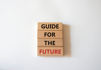 Wall Mural - Guide for the future symbol. Wooden blocks with words Guide for the future. Beautiful white background. Business and Guide for the future concept. Copy space.