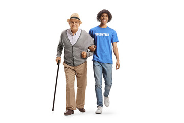 Full length portrait of an american african young male volunteer helping an elderly man