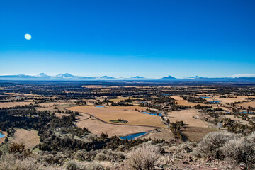 Wall Mural - A wide view of Central Oregon and the nearby Cascades from the top of Smith Rock State Park.