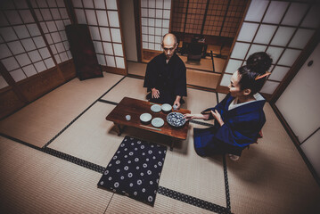 Wall Mural - Senior japanese couple moments in a traditional house