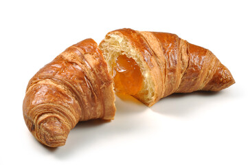 Croissant cut in half with apricot jam isolated on white background