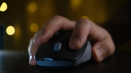 Man using computer wireless mouse, closeup