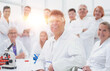 © ASDF - portrait of a successful supervisor and his team in the laboratory .