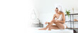 © Pixel-Shot - Morning of beautiful young woman shaving legs in bathroom. Banner for design