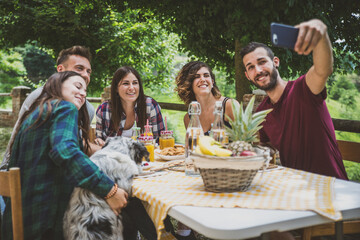 Poster - Group of friends spending time making a picnic