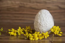 Close-up Of An Easter Egg With Yellow Flowers