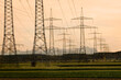 © Cavan Images - View of power pole and field, Bavaria, Germany