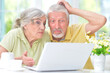 © aletia2011 - confused old couple with laptop at home