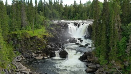 Wall Mural - Ristafallet waterfall in the western part of Jamtland is listed as one of the most beautiful waterfalls in Sweden.