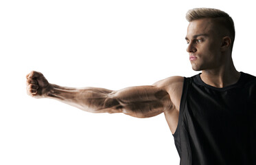 muscular attractive young man holds outstretched hand in front of him. muscular arm is tense. fist.