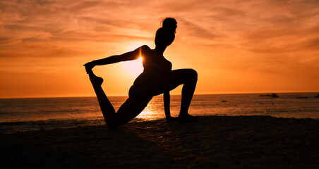 Sticker - Meditation, yoga and silhouette of woman on beach at sunrise for exercise, training and pilates workout. Motivation, fitness and shadow of girl balance by ocean for sports, wellness and stretching