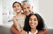 © Allistair F/peopleimages.com - Family, generations and hug with love in portrait and care at home, mother and grandmother with child smile and bond. Happiness, relationship and solidarity, women and girl with quality time together