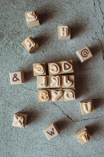 Overhead View Of Wooden Stamps With Capital Letters