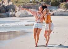 Couple Hug On Beach, Lesbian And Happy With Ocean, Gay Women Outdoor With Adventure And Freedom To Love. Interracial Relationship, Sea View And Holiday In Australia, Lgbtq With Travel And Walking