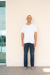 Wall Mural - Portrait of handsome bald man wearing t-shirt