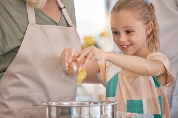 Canvas Print - Child, girl and baking with eggs, grandparent or senior woman in kitchen, bonding house or family home for pastry, dessert cake or food. Happy smile, cooking and kid learning a bakery cookies recipe