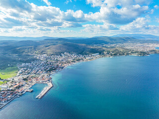 Wall Mural - Aerial view with drone of the seaside town Urla Cesmealti in Izmir, Turkey. Iskele port.