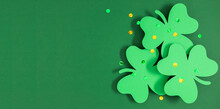 Patrick's Day Composition. Holiday Decoration For St. Patricks Day, Clover Leaf On Green Background. Flat Lay, Top View, Copy Space 