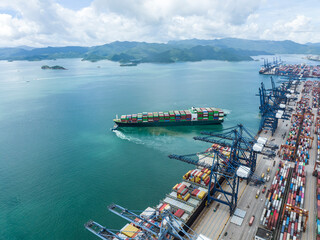 Aerial view of Manufacturing logistics cargo container ship at ship port in Yantian port, shenzhen city, China.export import business logistic international.