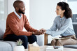 © Rene La/peopleimages.com - Psychology, support and black woman, psychologist or therapist holding hands, client empathy and depression. Mental health, counseling and therapy patient talking of problem, health expert listening
