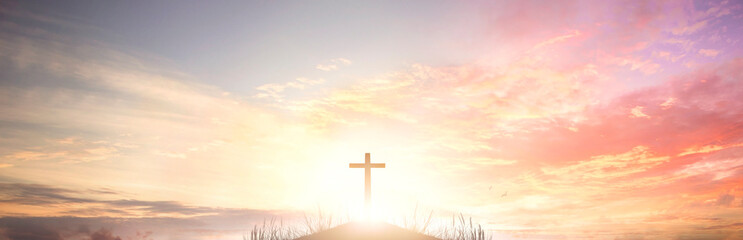 Wall Mural - the cross of god in the rays of the sunset background