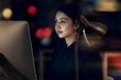 © Clayton D/peopleimages.com - Woman, night office and focus at computer for seo planning, research or agenda in dark startup. Female working overtime on desktop technology, online and network data of internet analytics on website